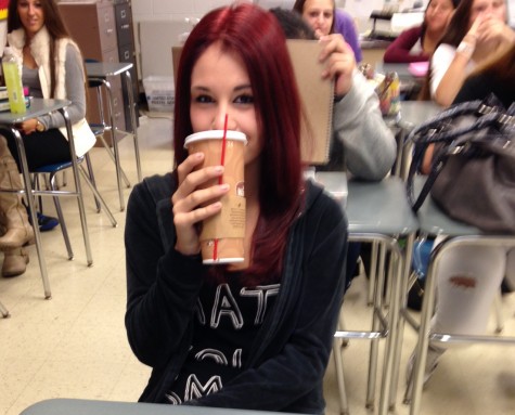 Sophomore Cece Schroeder drinks her daily coffee in before first period.