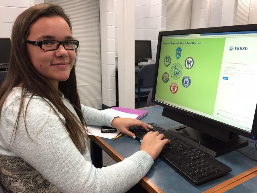 Junior Emily Katz checks out the new email system