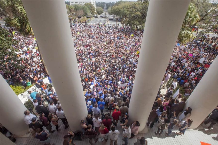 Protesters rally against gun violence on the steps of the old Florida Capitol in Tallahassee, Florida on Feb 21.
